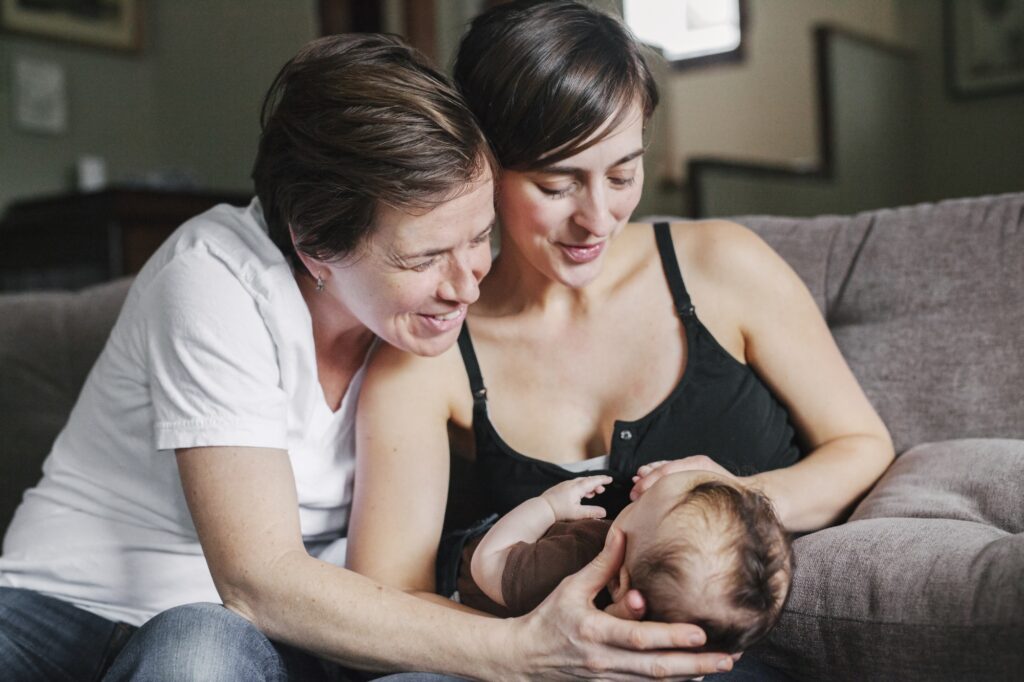 A Same Sex Couple, Two Women Playing With Their 6 Month Old Baby Girl. ,lifestyle,usa
